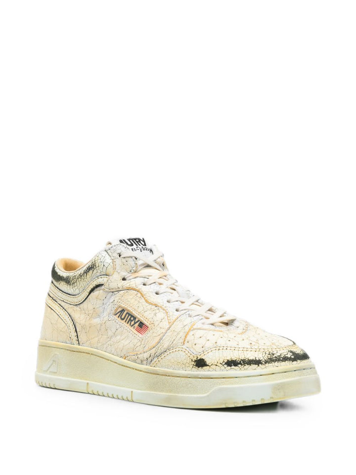 Sneakers bianche in pelle 