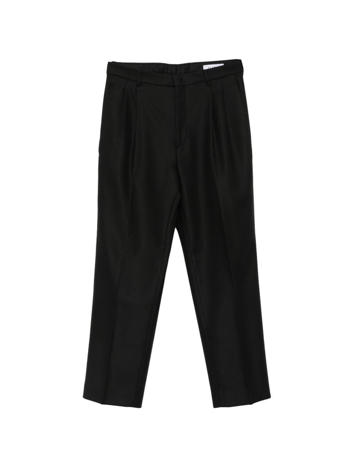 Pantaloni neri affusolati con pieghe 