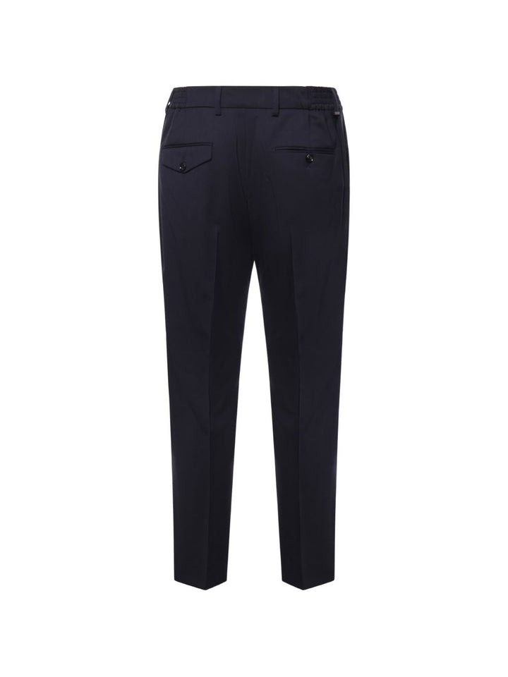 Pantaloni blu con vita elasticizzata e piega stirata 