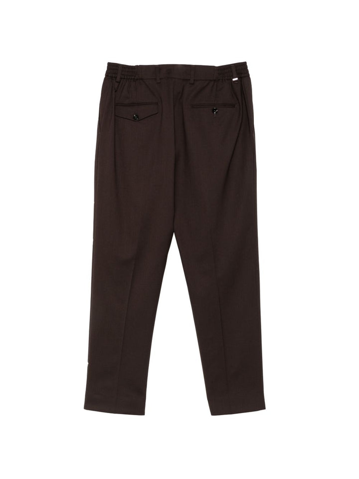 Pantaloni marroni con vita elasticizzata e piega stirata 