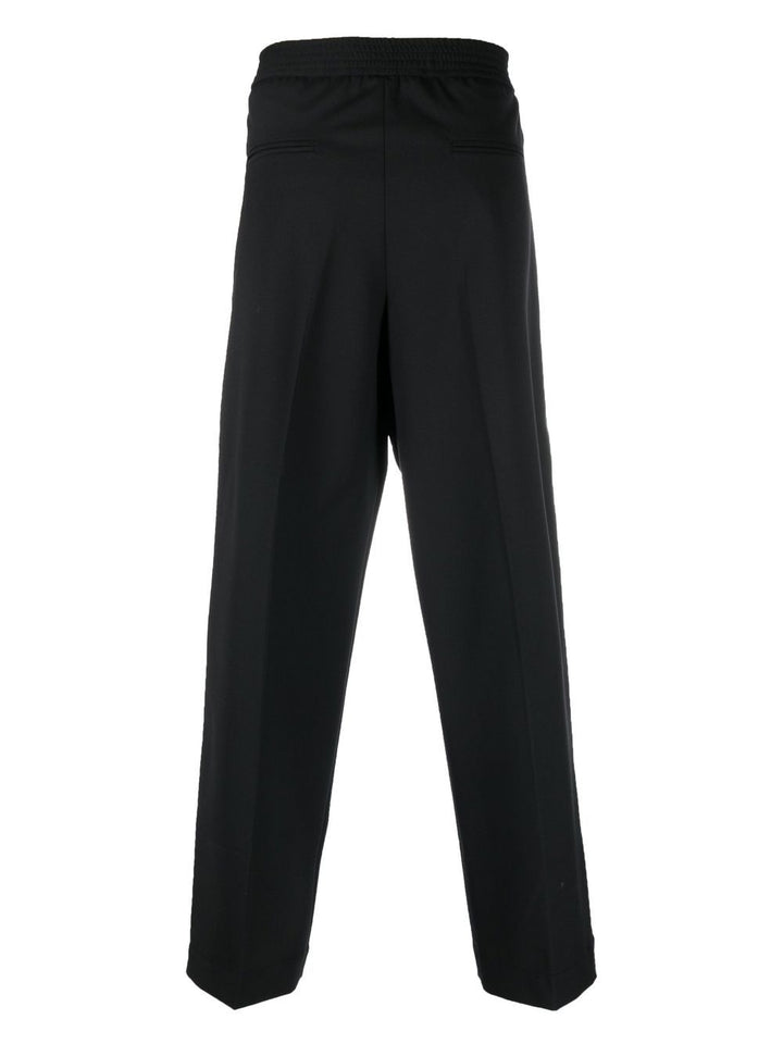 Pantaloni sartoriali neri a vita media in misto lana vergine 