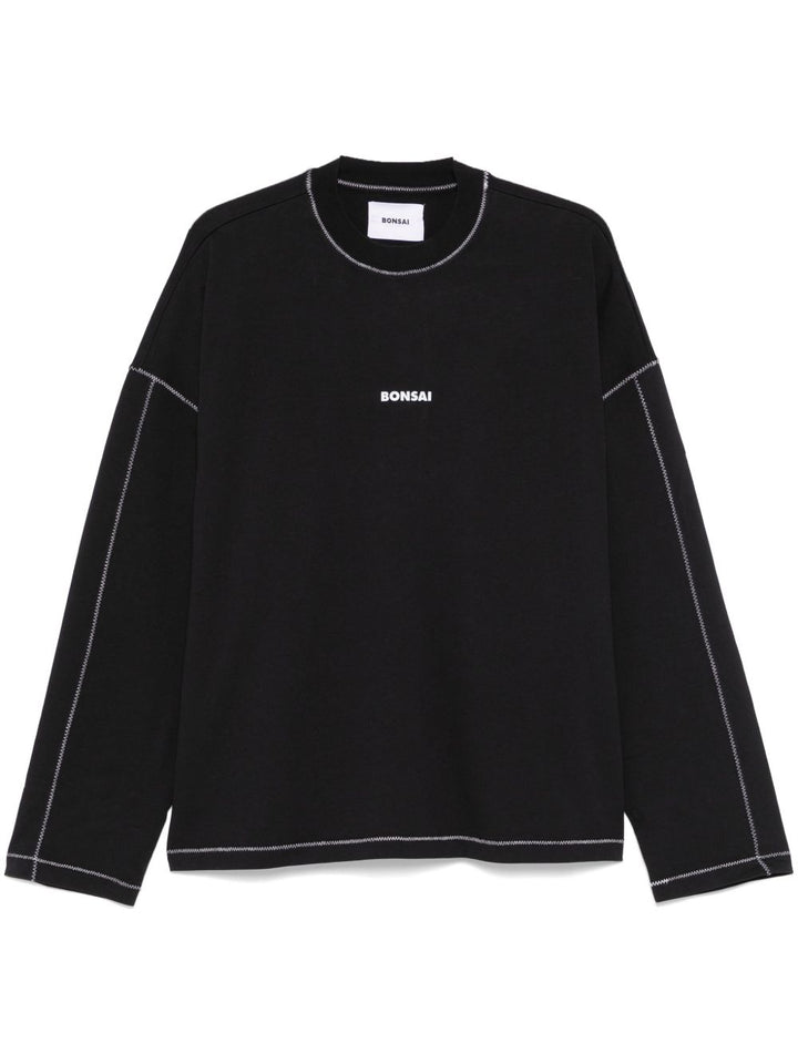 T-shirt nera a maniche lunghe in cotone con stampa 