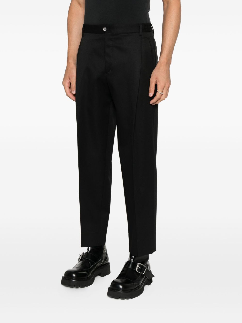 Pantaloni neri in lana con pieghe 