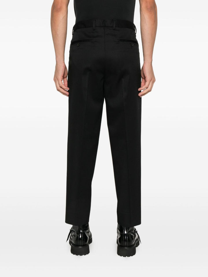 Pantaloni neri in lana con pieghe 