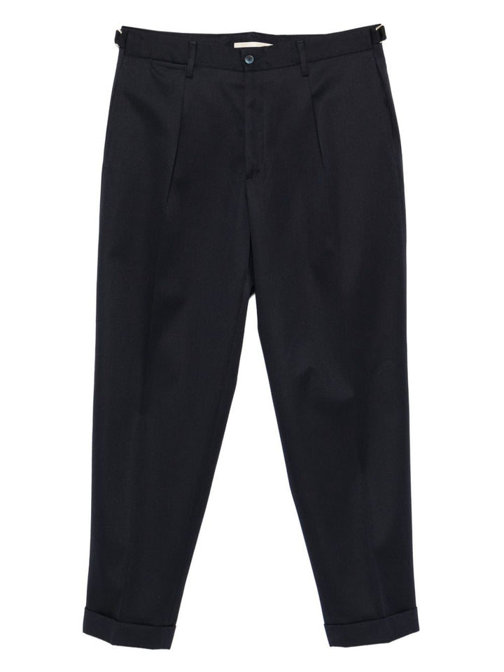 Pantaloni blu navy in lana con pieghe 