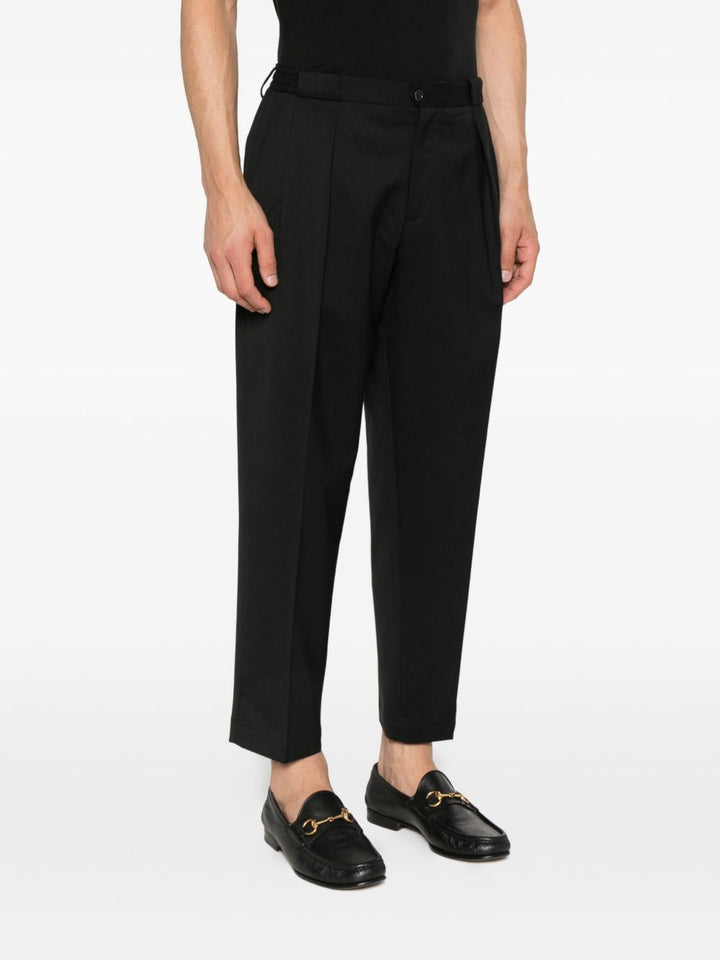 Pantaloni neri con pieghe frontali 