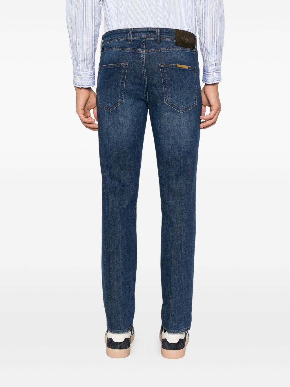 Jeans blu navy slim fit con lavaggio sfumato 