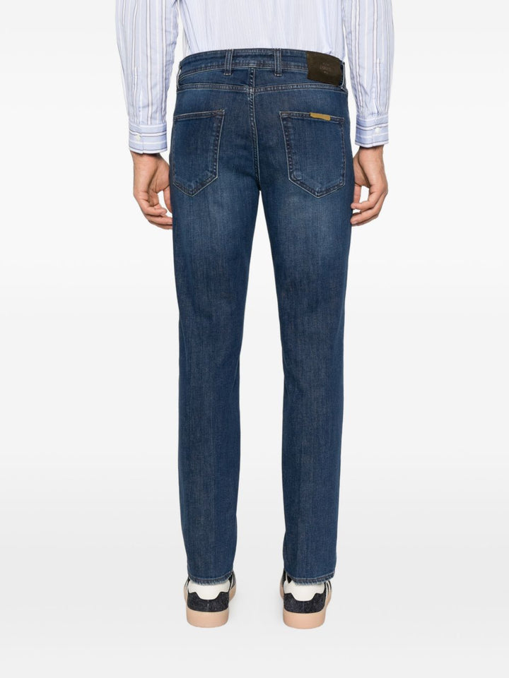 Jeans blu navy slim fit con lavaggio sfumato 