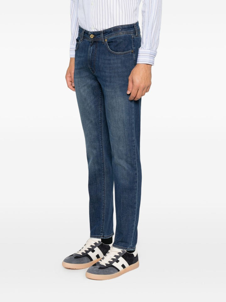 Jeans blu navy slim fit con lavaggio sfumato 