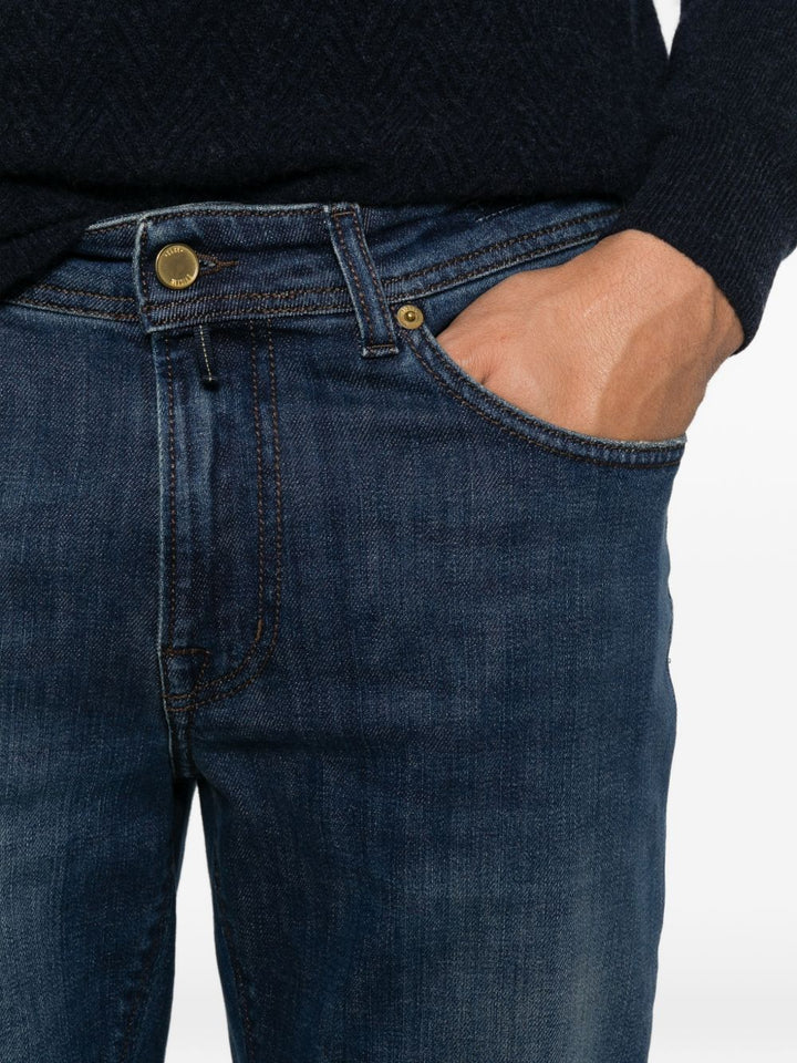 Jeans blu navy slim fit con lavaggio sfumato 