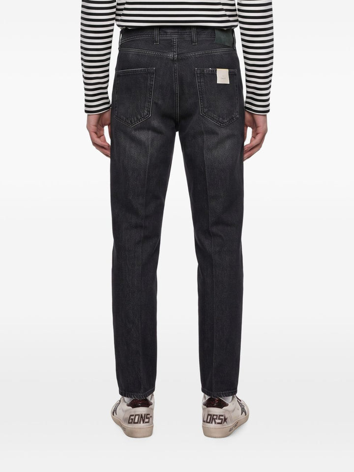 Jeans nero con effetto schiarito 