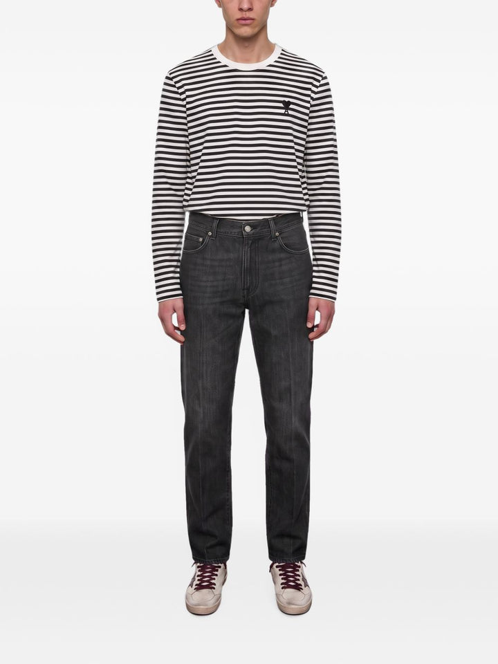 Jeans nero con effetto schiarito 
