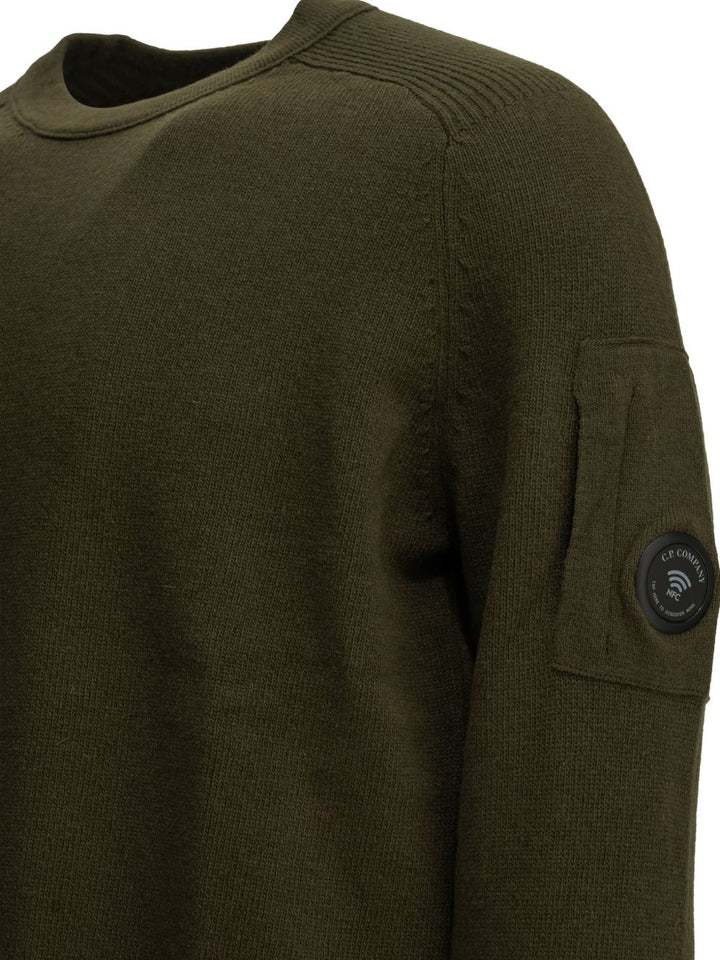 Maglione verde in lana con dettaglio Lente 