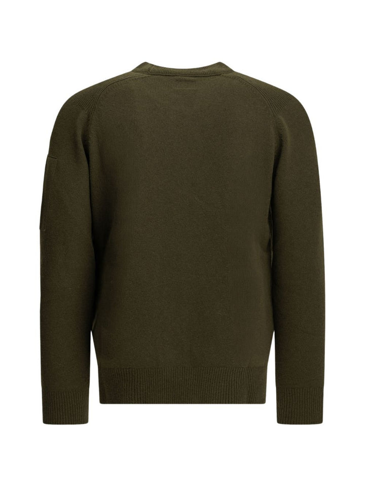 Maglione verde in lana con dettaglio Lente 