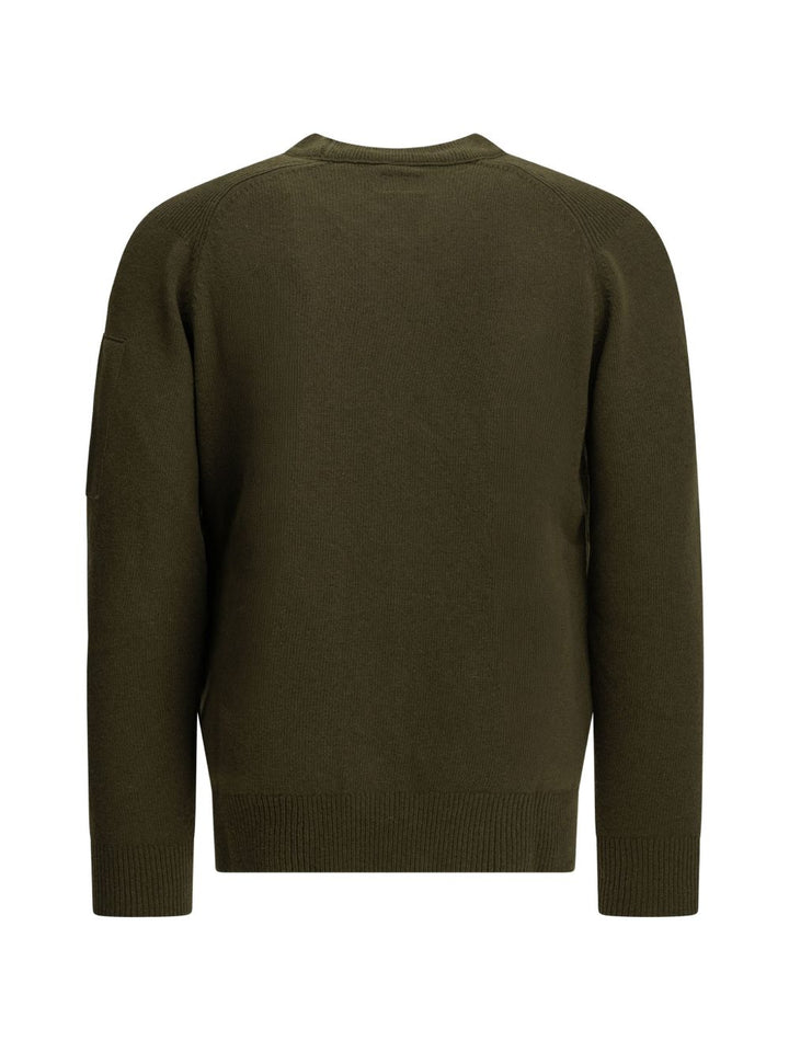 Maglione verde in lana con dettaglio Lente 