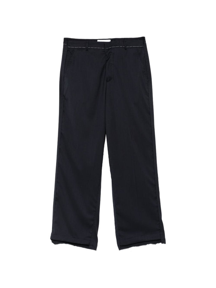 Pantaloni blu dritti con cuciture a contrasto 