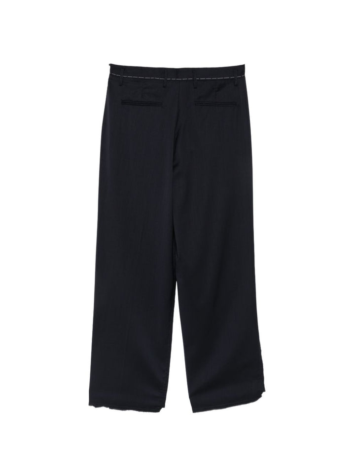 Pantaloni blu dritti con cuciture a contrasto 