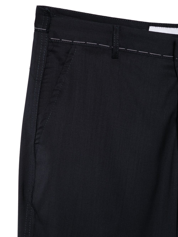 Pantaloni blu dritti con cuciture a contrasto 