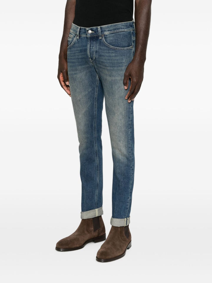 Jeans blu slim con effetto schiarito 