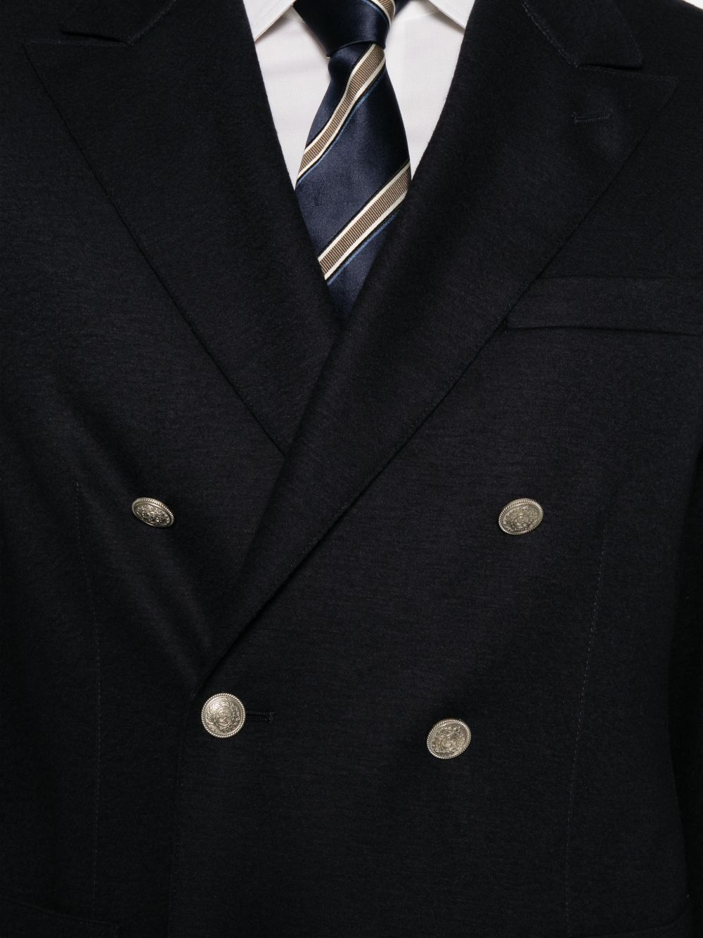 Blazer doppiopetto blu con revers a lancia 