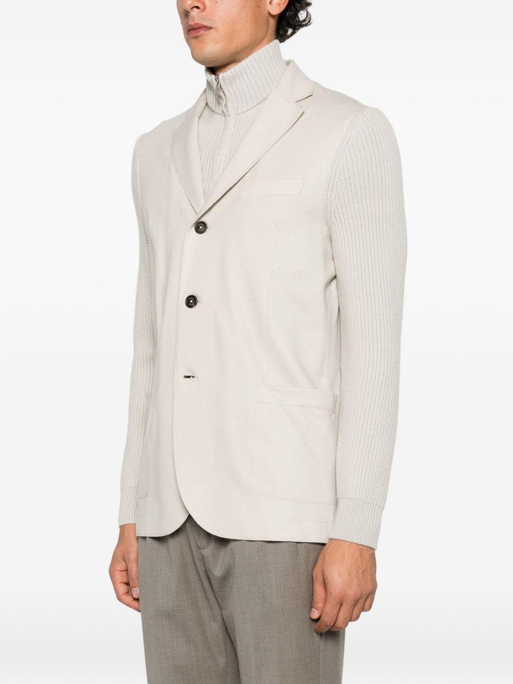 Blazer sabbia in lana a coste con collo alto 