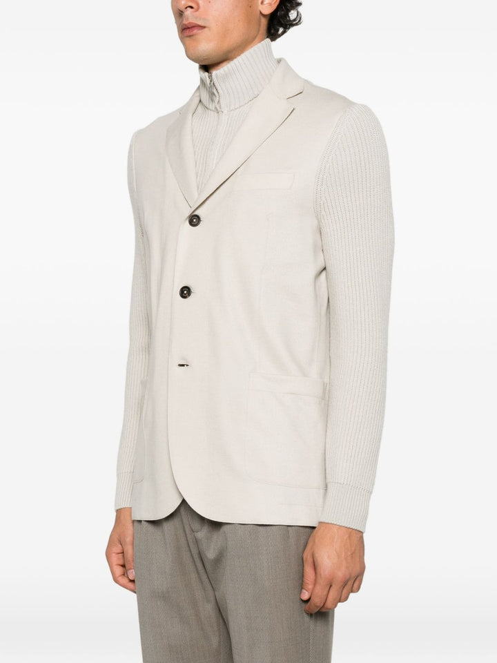 Blazer sabbia in lana a coste con collo alto 