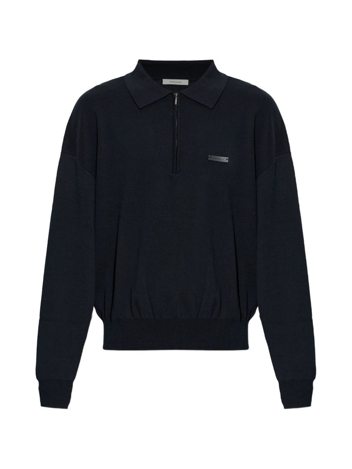 Polo nera con mezza zip 