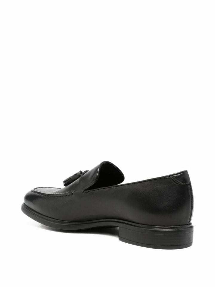 Mocassini con nappine in pelle nera 
