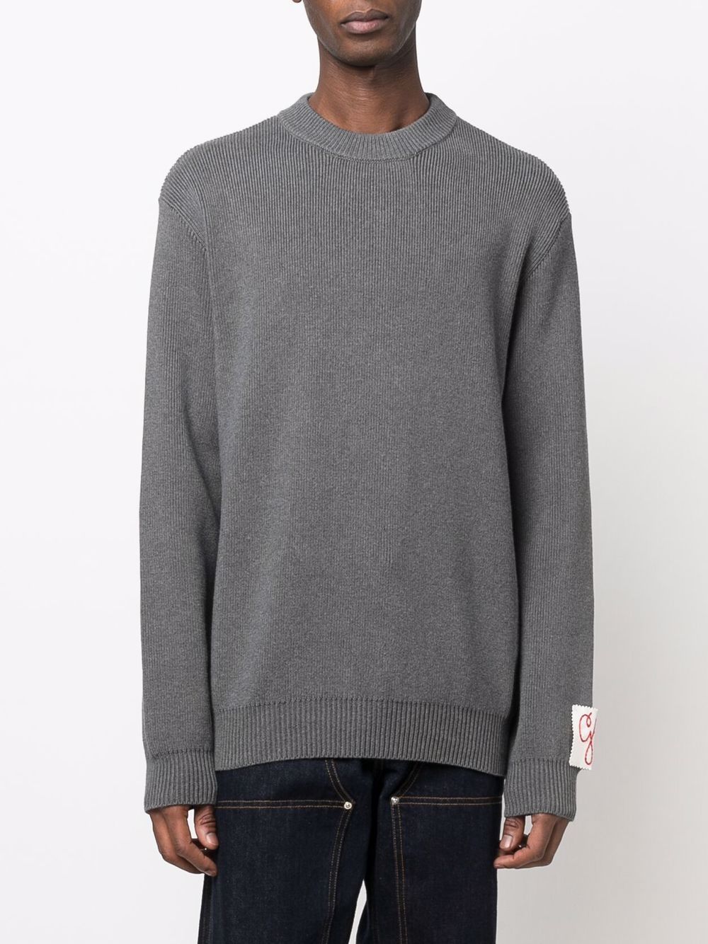 Maglione grigio con applicazione 