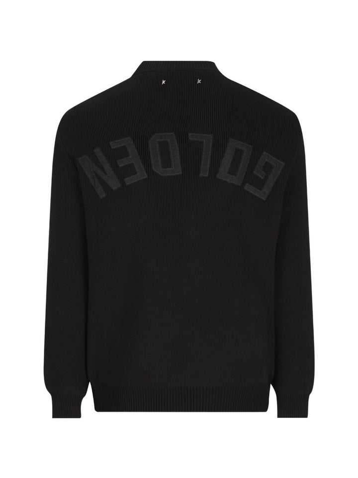 Maglione nero girocollo con logo ricamato 