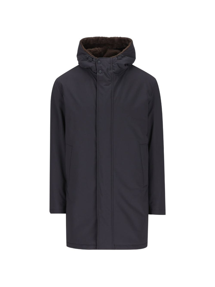Giacca blu  con cappuccio e rifiniture in pelliccia sintetica 