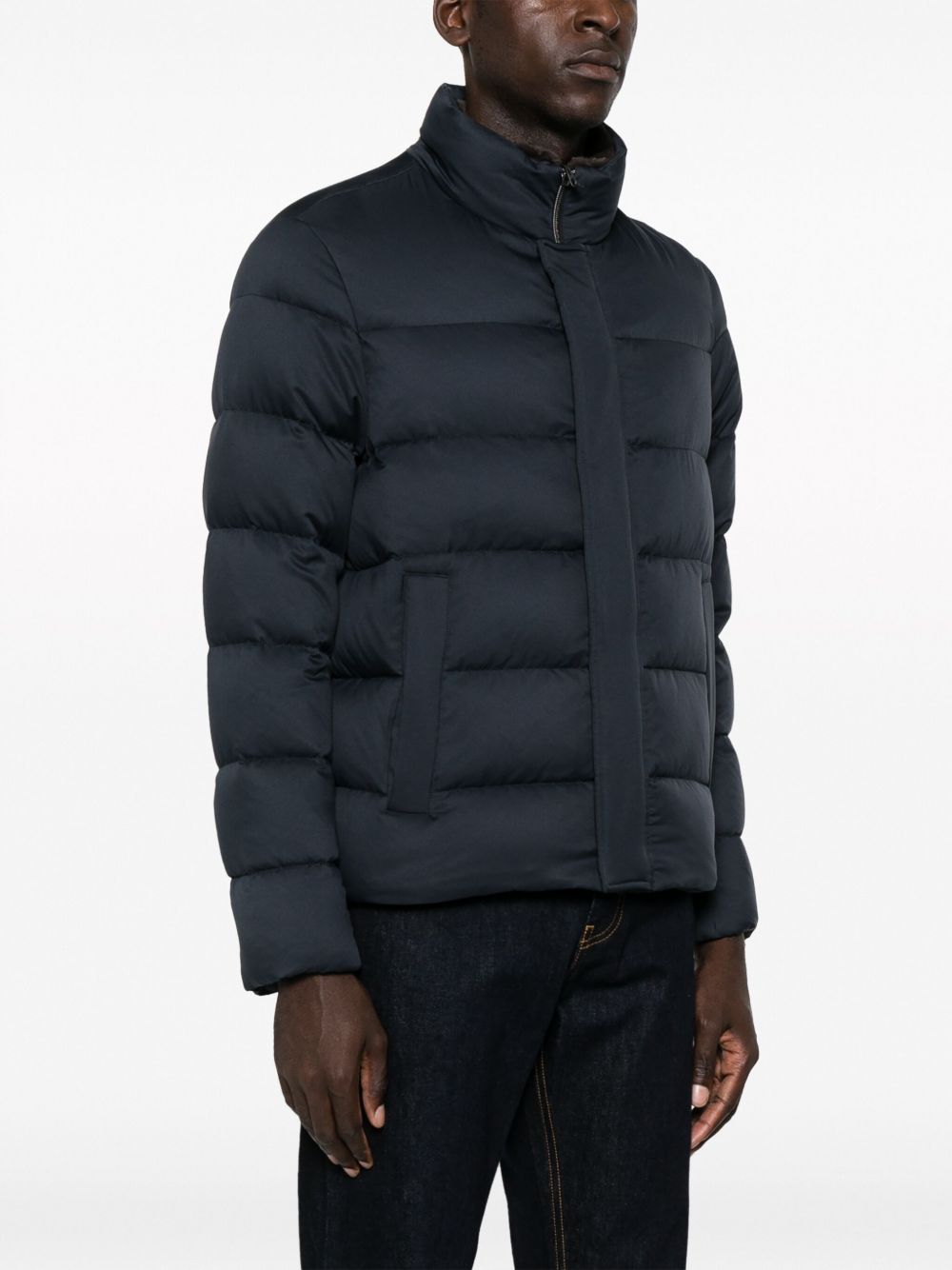 Piumino blu navy Herno a collo alto 
