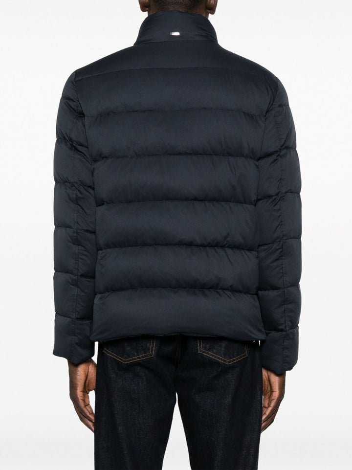 Piumino blu navy  a collo alto 