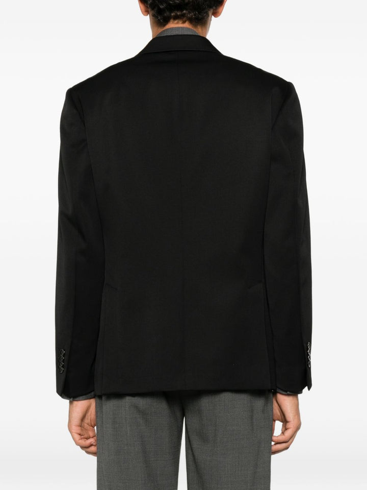 Blazer doppiopetto nero con revers a lancia 
