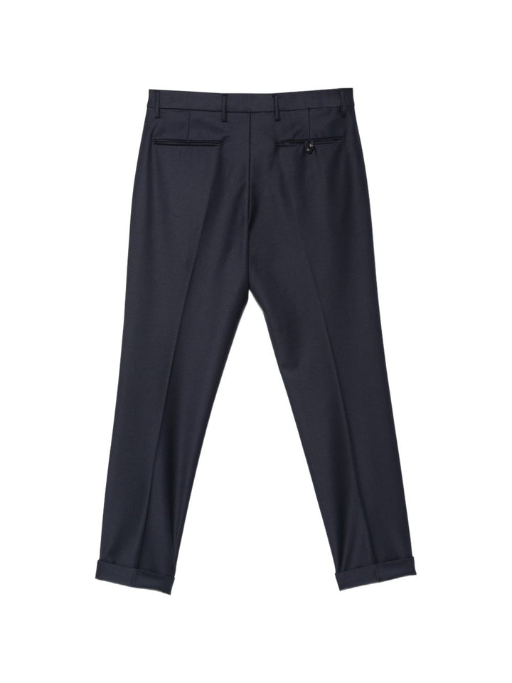 Pantaloni blu navy Frederick con pieghe e risvolto 