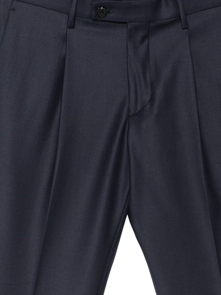Pantaloni blu navy Frederick con pieghe e risvolto 