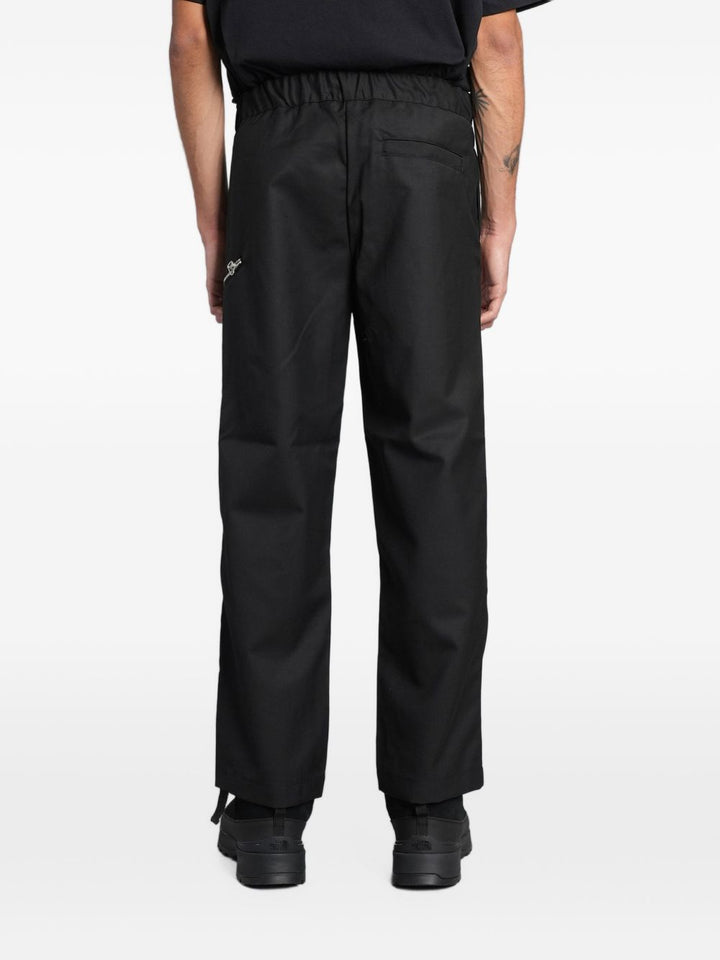 Pantaloni neri Oamc Peacemaker con cintura e zip 