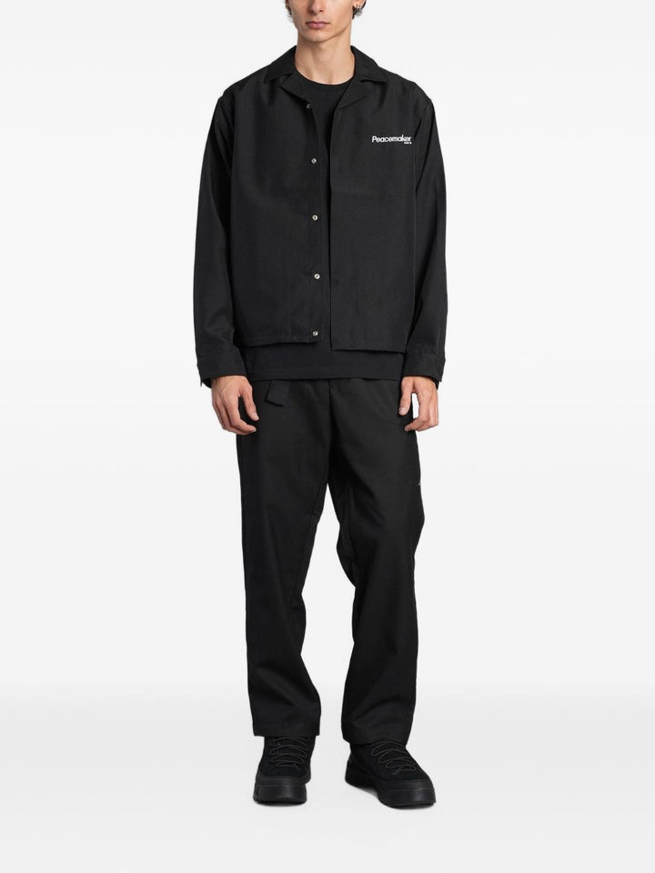 Pantaloni neri Oamc Peacemaker con cintura e zip 
