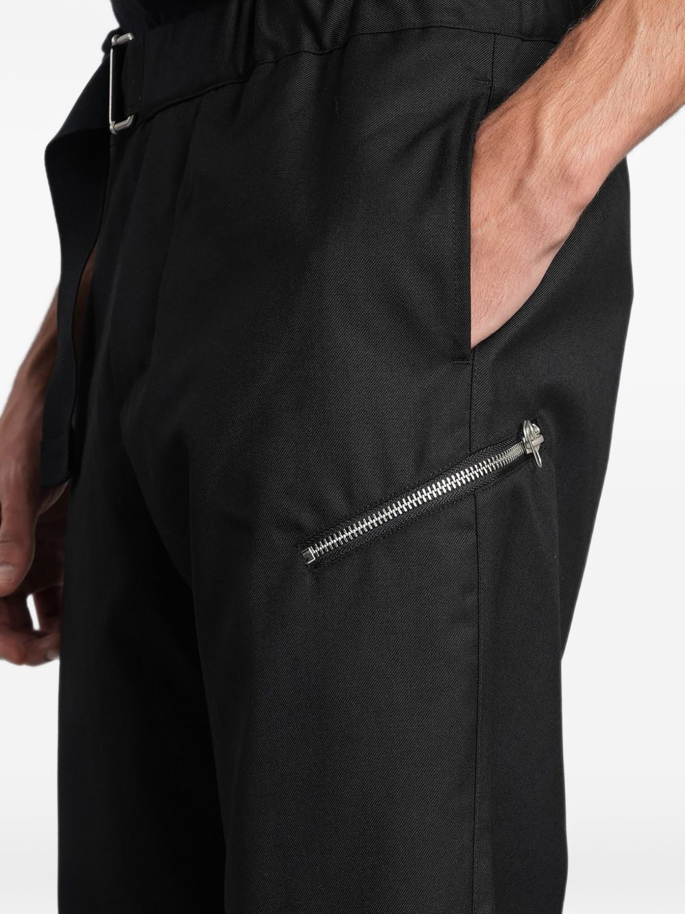 Pantaloni neri Oamc Peacemaker con cintura e zip 