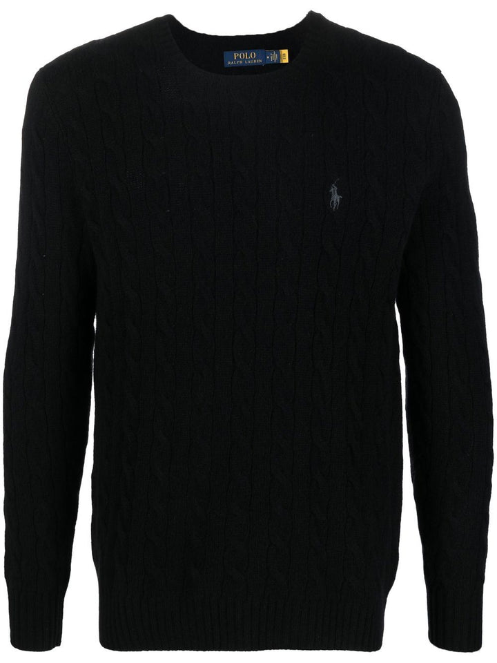 Maglione nero a trecce con ricamo 
