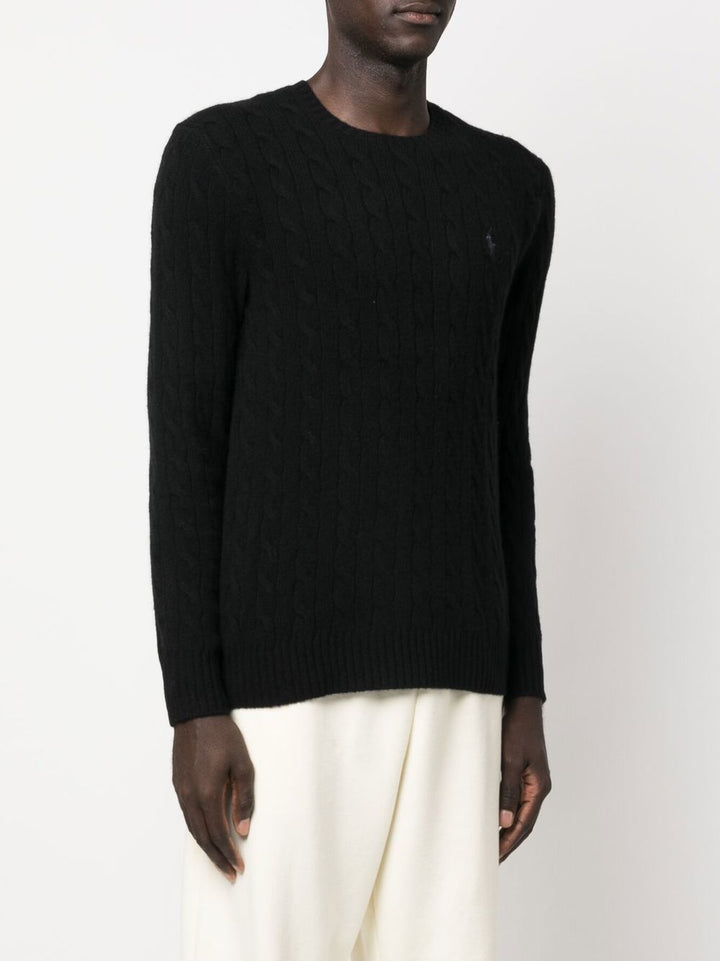 Maglione nero a trecce con ricamo 