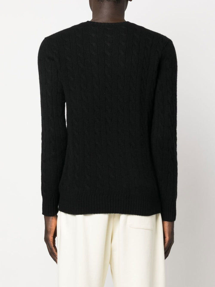Maglione nero a trecce con ricamo 