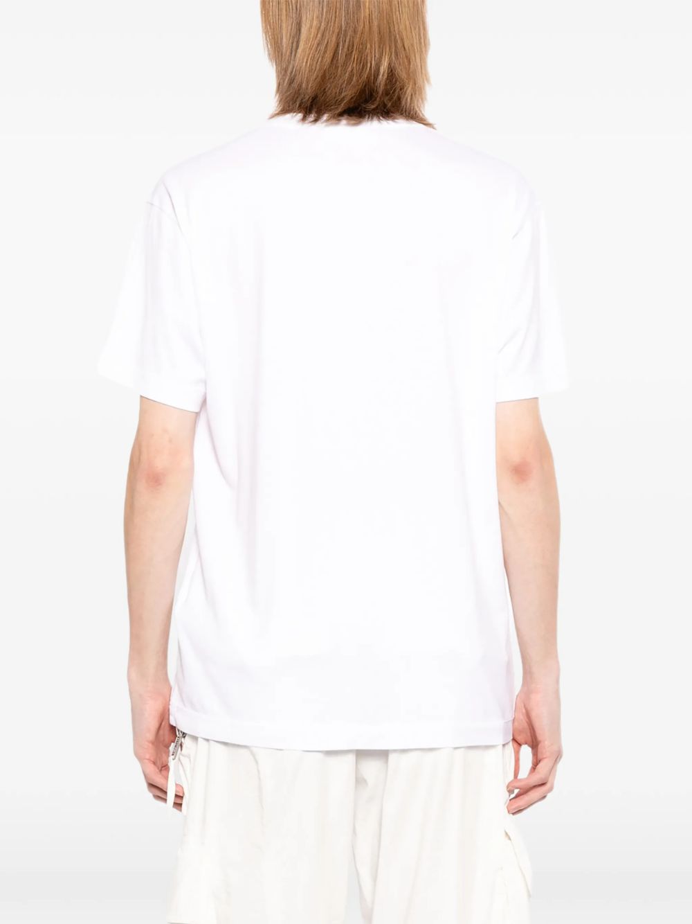 T-shirt bianca con applicazione logo 