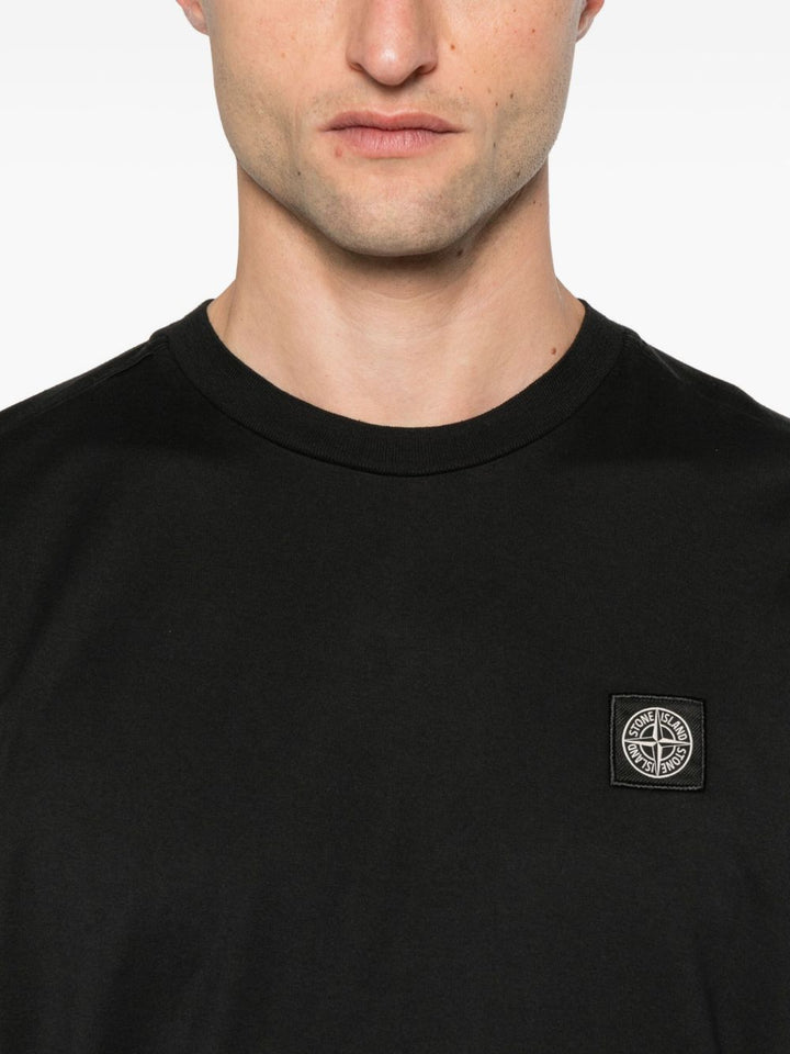 T-shirt nera con applicazione logo 