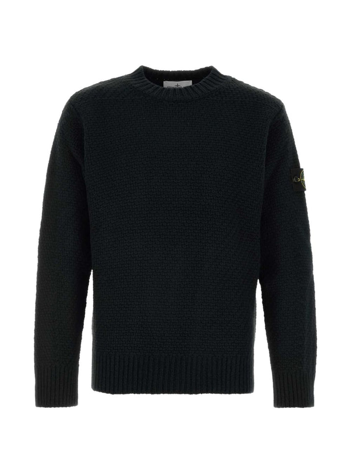 Maglione nero girocollo in lana con lavorazione a intreccio 