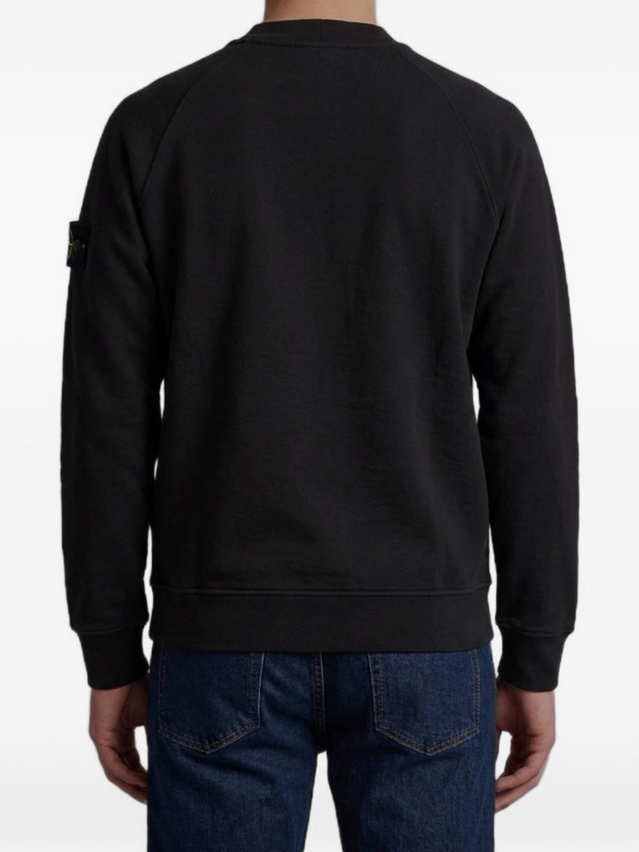 Maglione nero con maniche raglan 