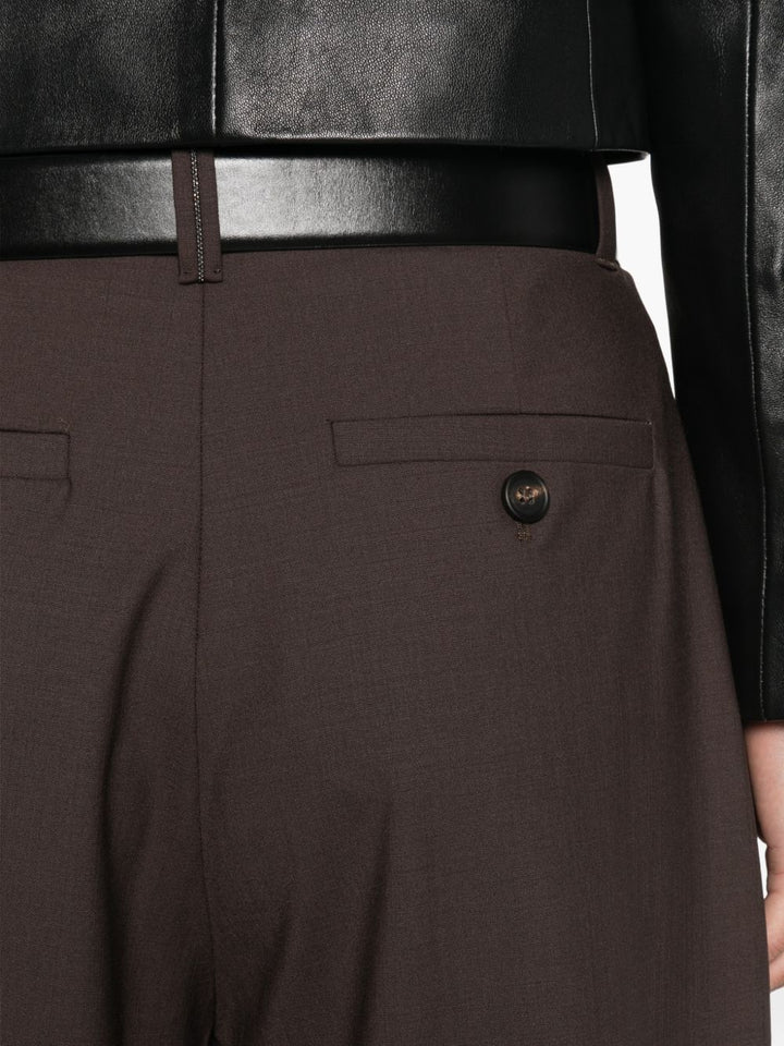 Pantaloni a gamba ampia con pieghe 