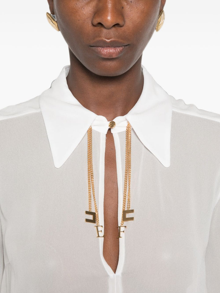 Blusa con dettaglio 