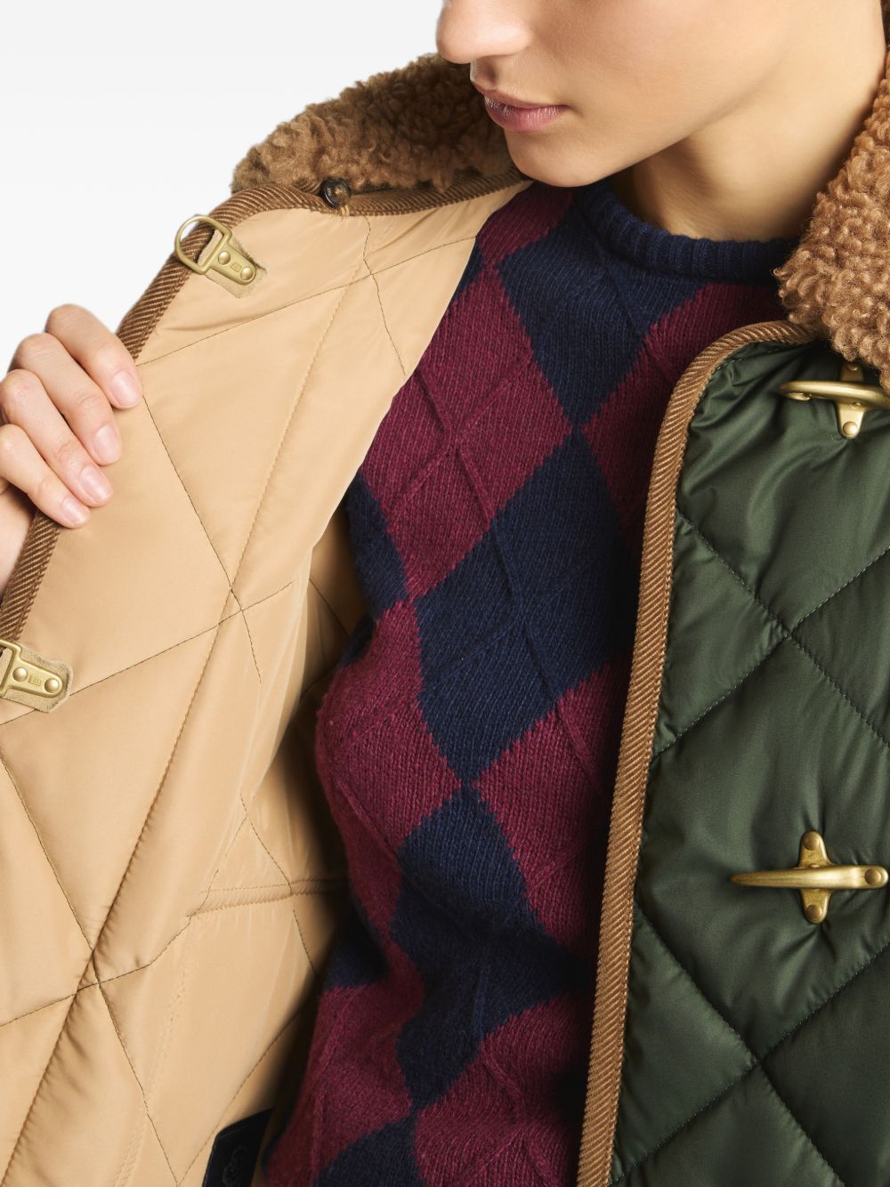 Giacca trapuntata con colletto in shearling 
