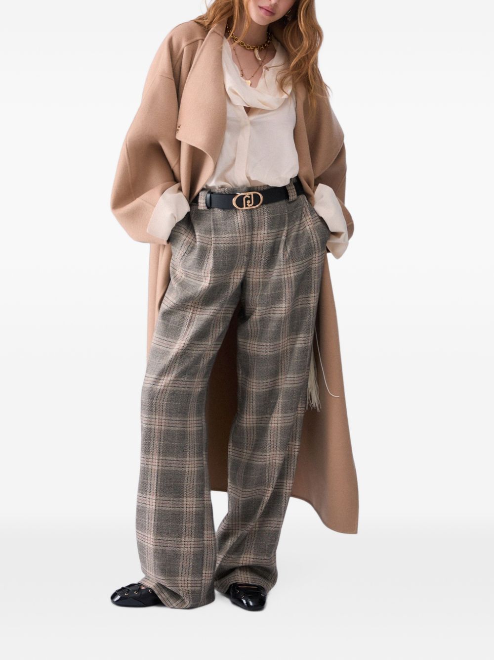 Pantaloni palazzo con cintuira di LIU JO. 